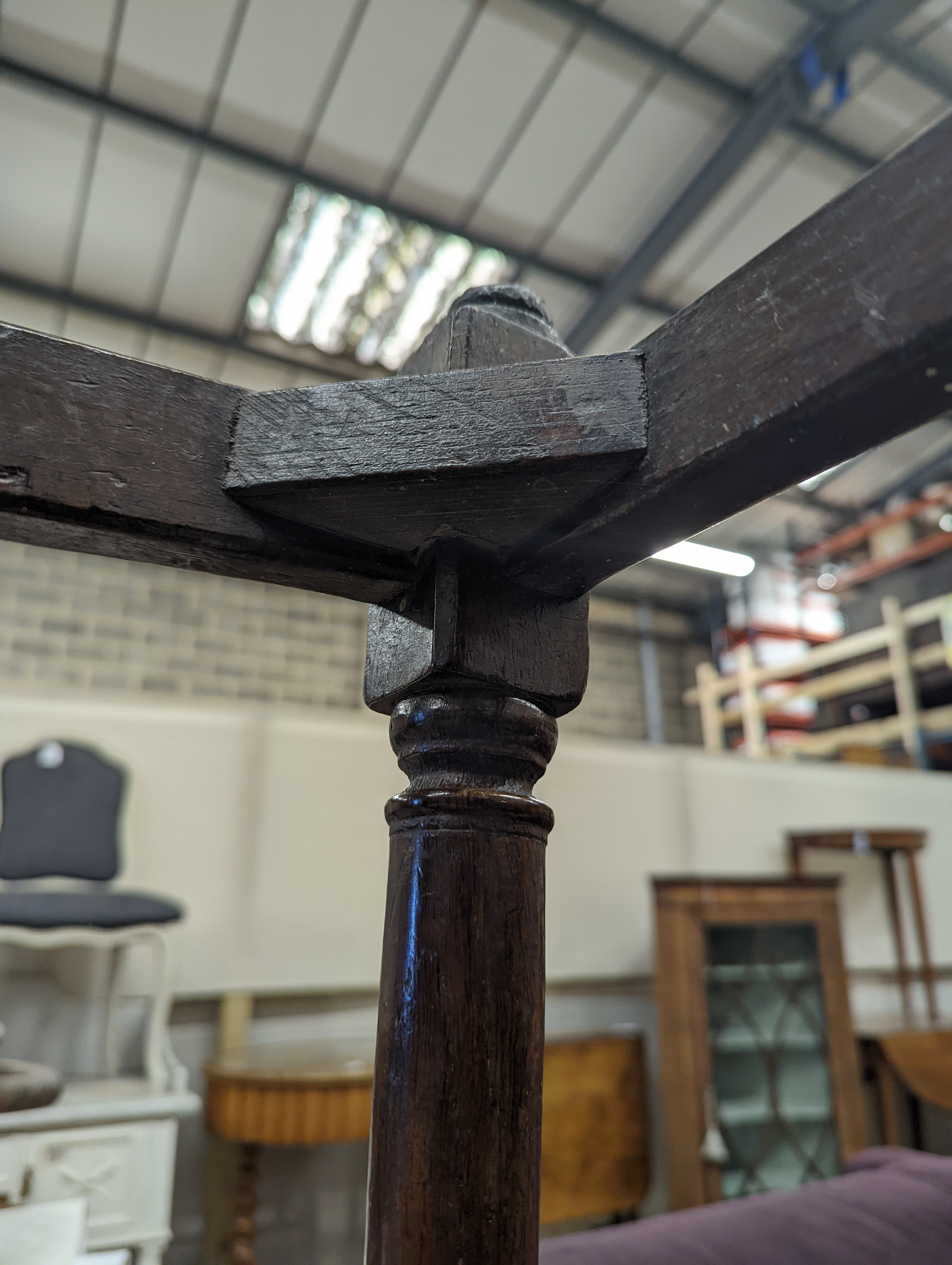 A 17th century style oak joint stool, width 46cm, depth 26cm, height 46cm and a George III stool with Victorian needlework seat, length 33cm